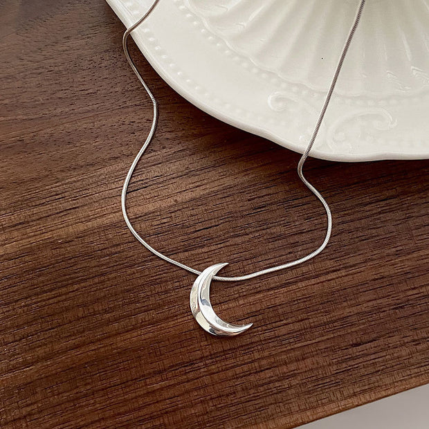 Sterling Silver Curved Moon Necklace