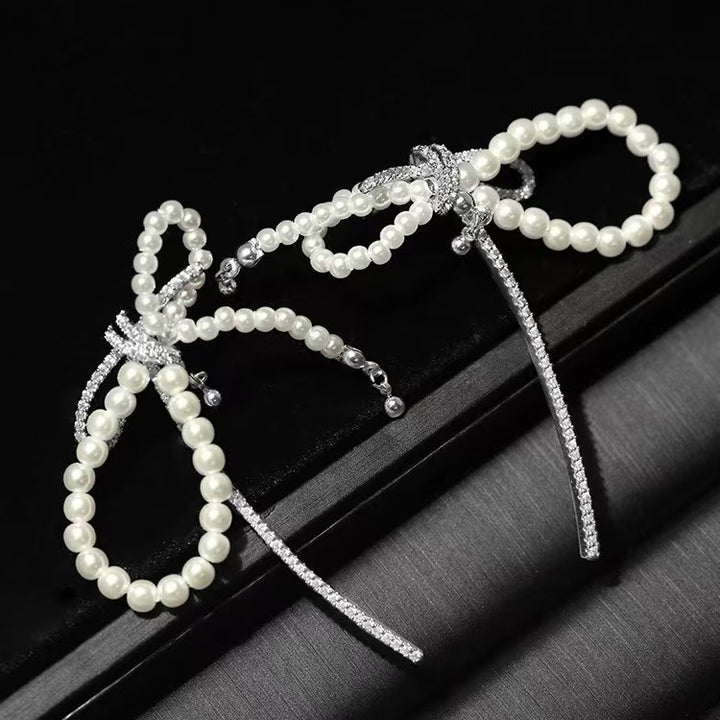 Sterling Silver Bow Pearl Earrings