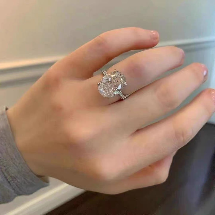 Oval Solitaire Pavé Moissanite Ring