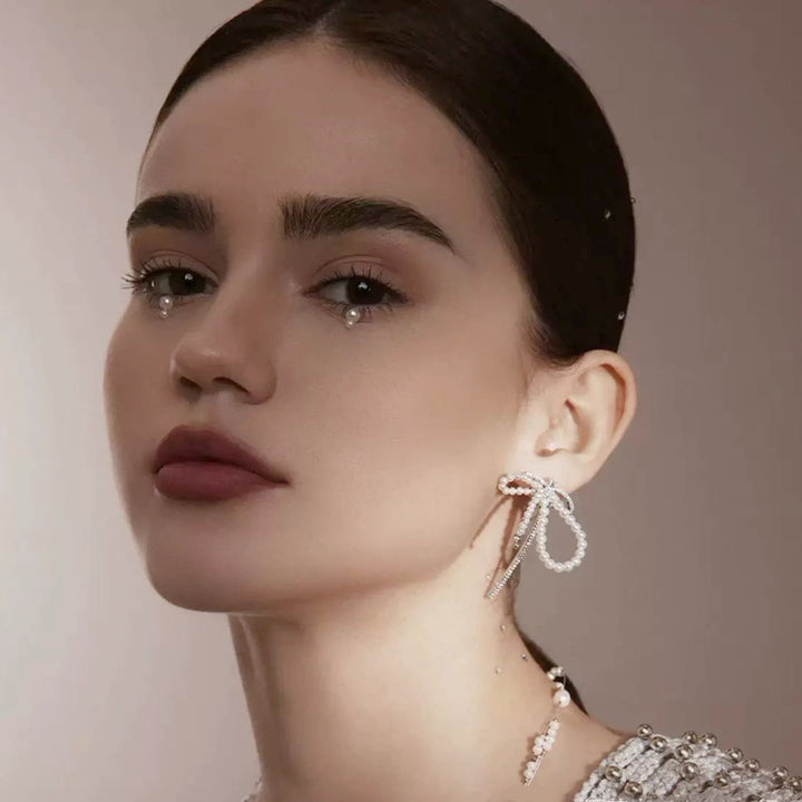 Sterling Silver Bow Pearl Earrings