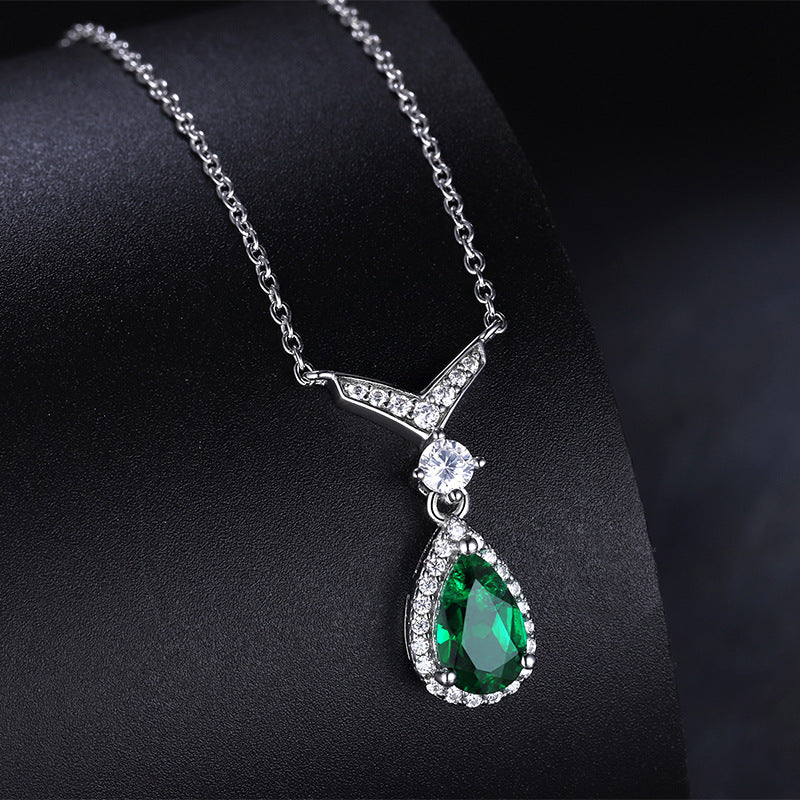 Whale Tail Emerald & Moissanite Necklace