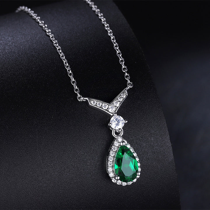 Whale Tail Emerald & Moissanite Necklace