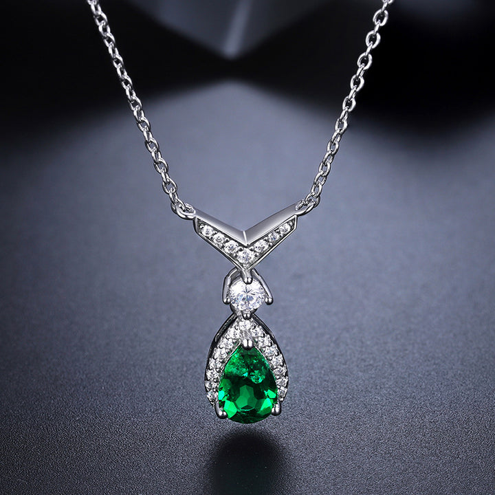 Whale Tail Emerald & Moissanite Necklace