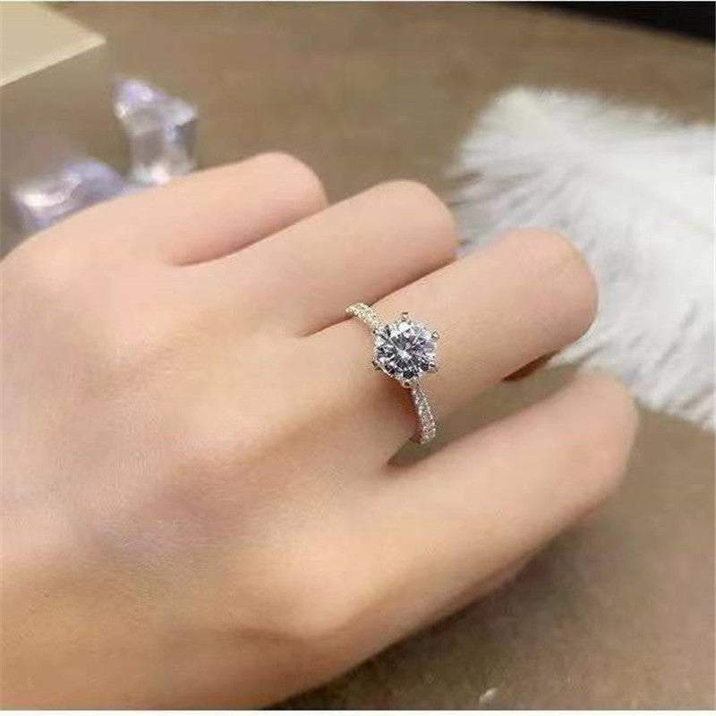 Aurora Six-Prong Moissanite Solitaire Ring with Pavé Shoulders