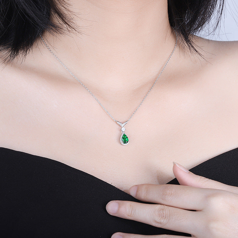Whale Tail Emerald & Moissanite Necklace