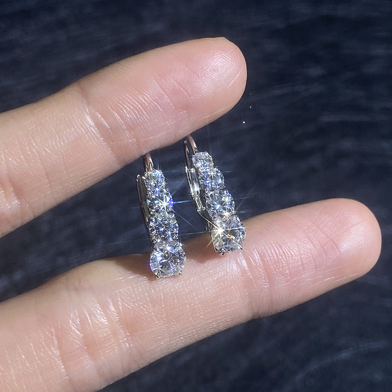 Graduated Moissanite Huggie Earrings