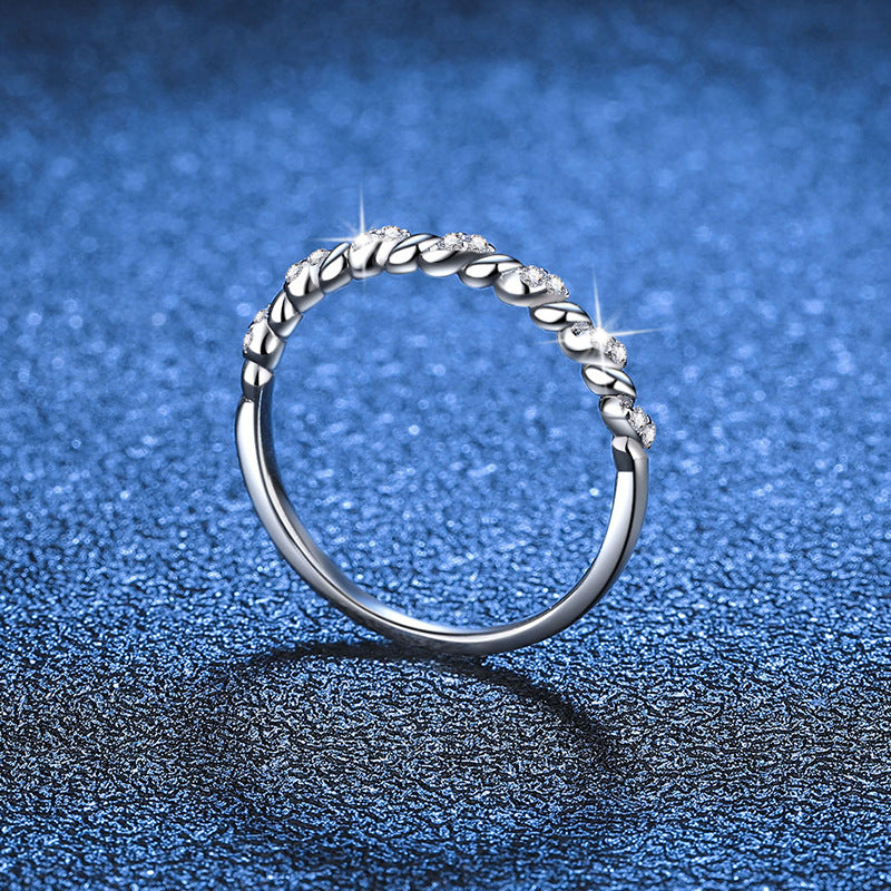 Whisper Twist Moissanite Ring