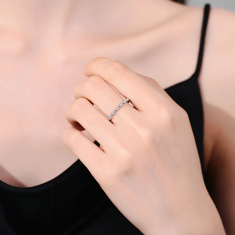 Whisper Twist Moissanite Ring