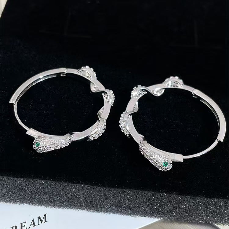 Zirconia Snake Twist Earrings