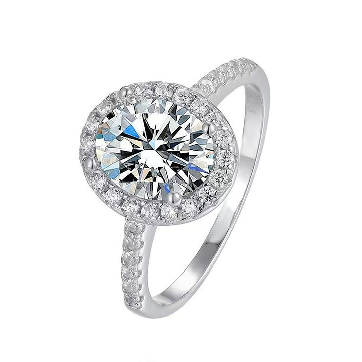 Oval “Pigeon Egg” Halo Moissanite Ring