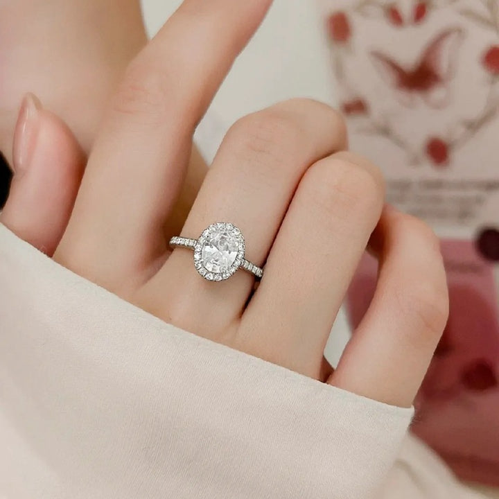 Oval “Pigeon Egg” Halo Moissanite Ring