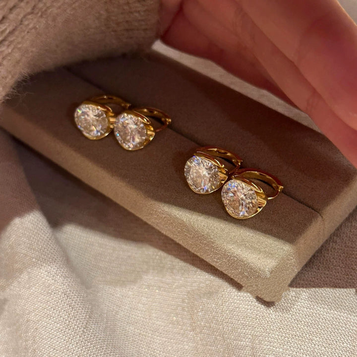 Round Cut Moissanite Huggie Earrings