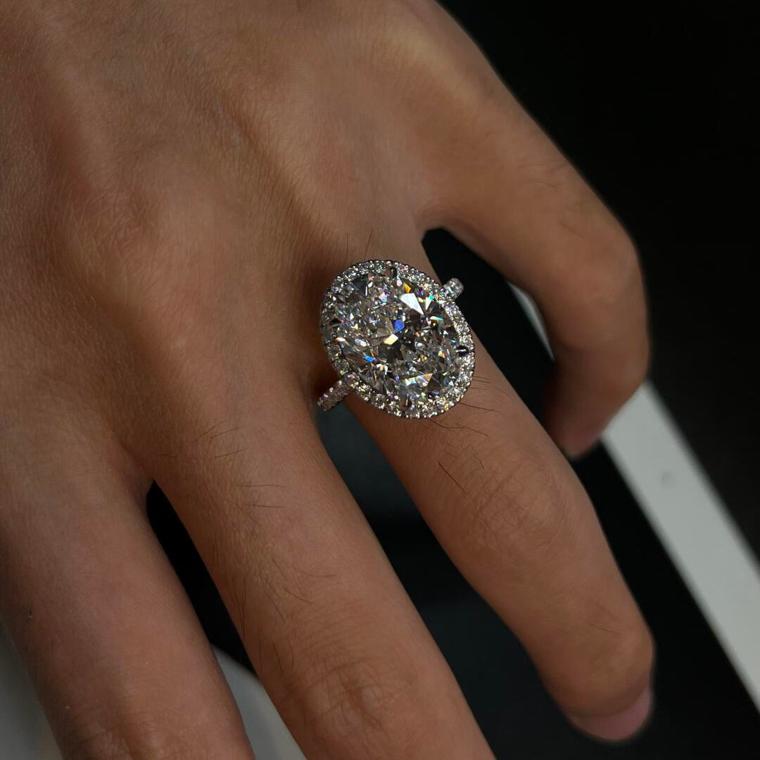 Oval “Pigeon Egg” Halo Moissanite Ring