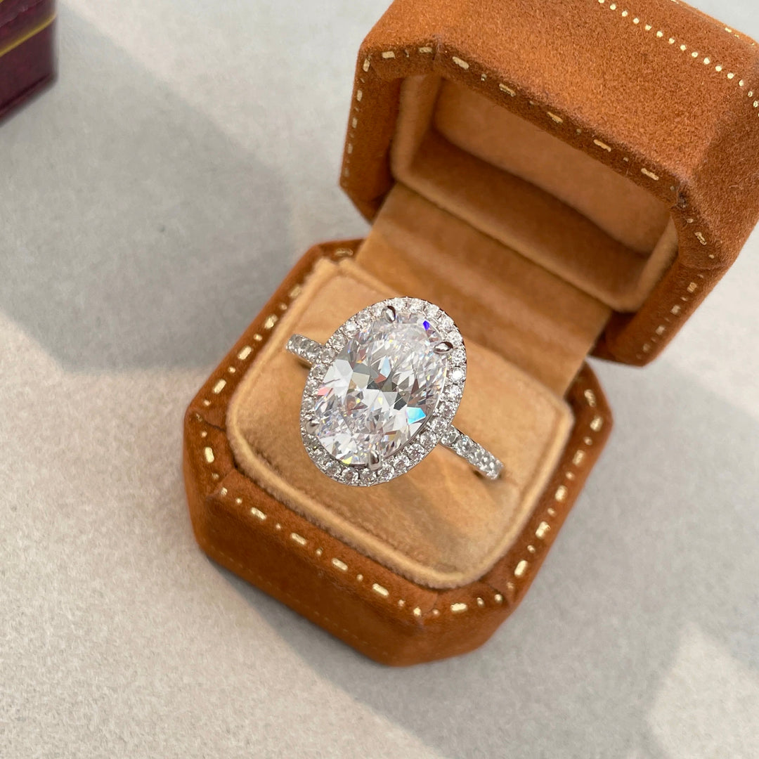 Oval “Pigeon Egg” Halo Moissanite Ring