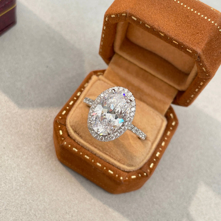 Oval “Pigeon Egg” Halo Moissanite Ring