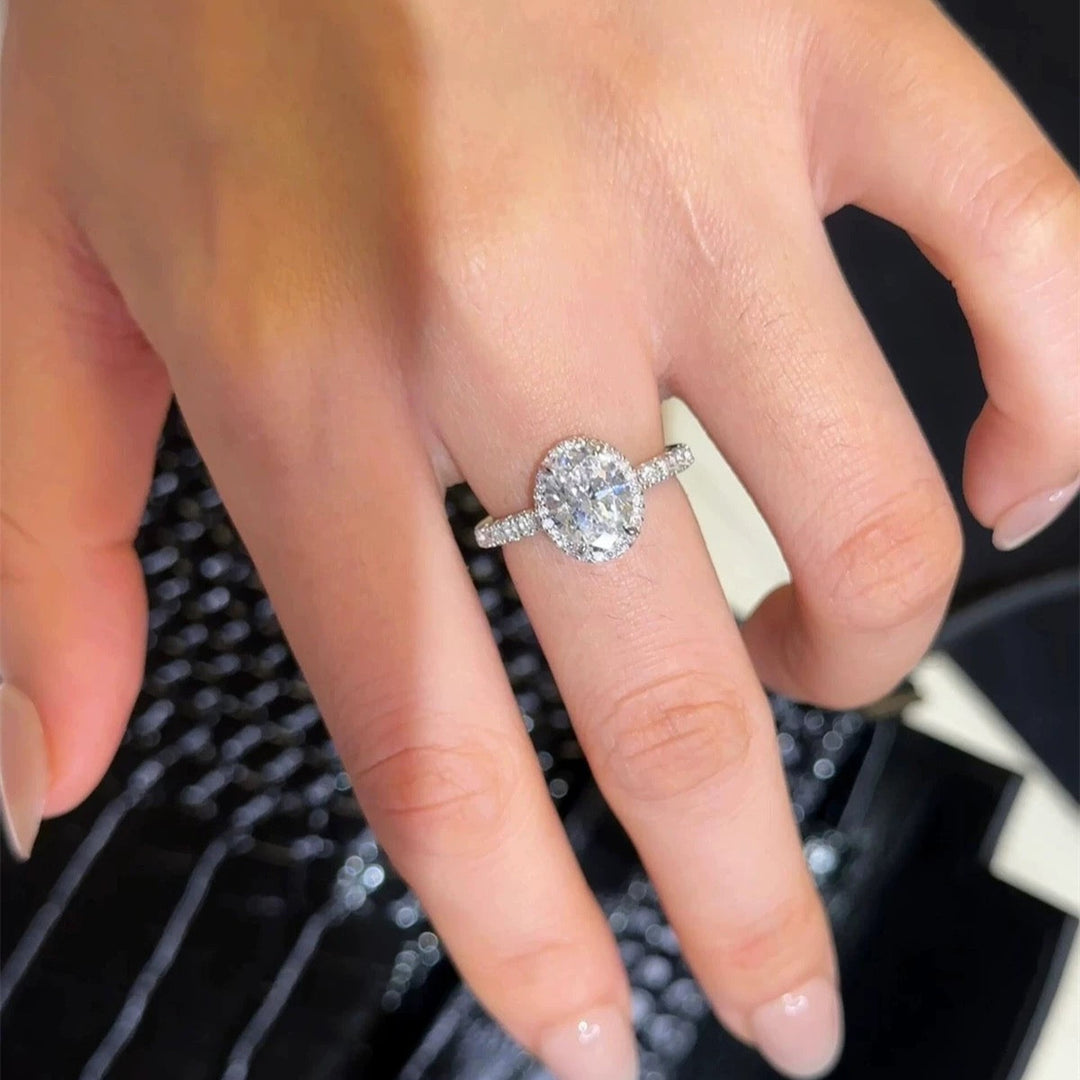 Oval “Pigeon Egg” Halo Moissanite Ring