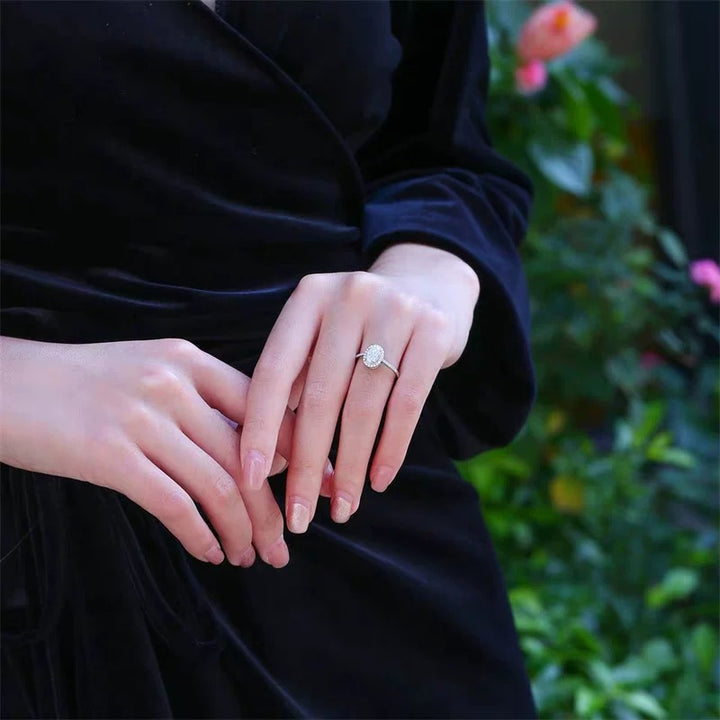 Oval “Pigeon Egg” Halo Moissanite Ring