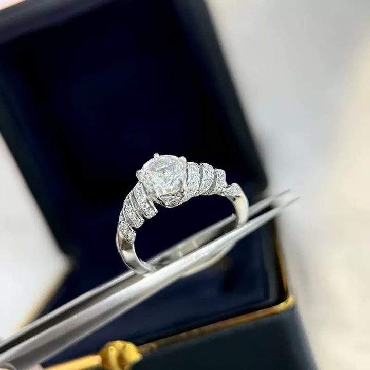 Tidal Wave Swirl Moissanite Ring