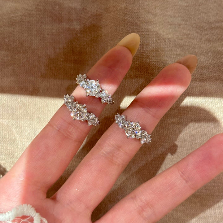 Round-Cut Moissanite Three-Stone Ring — Cluster Side Design