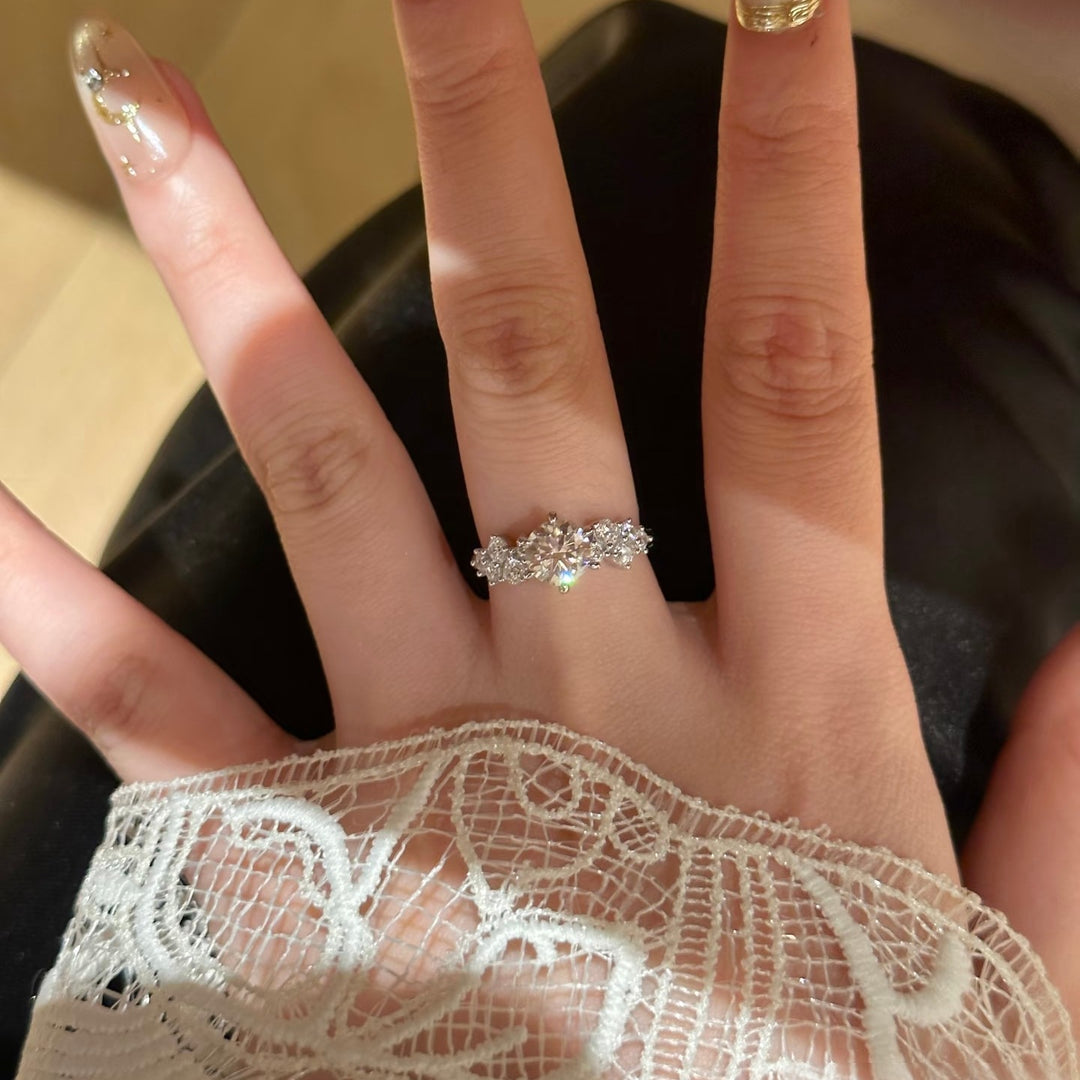 Round-Cut Moissanite Three-Stone Ring — Cluster Side Design