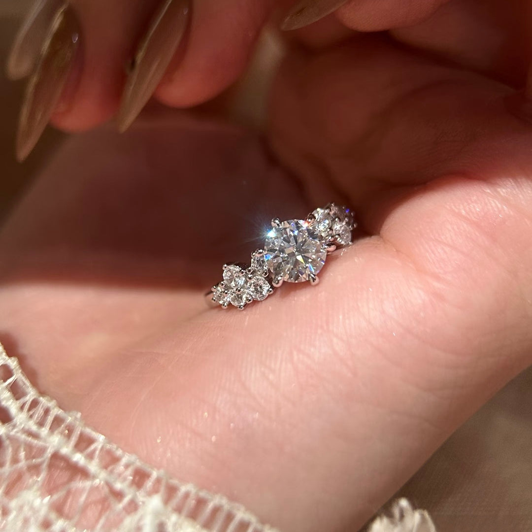 Round-Cut Moissanite Three-Stone Ring — Cluster Side Design