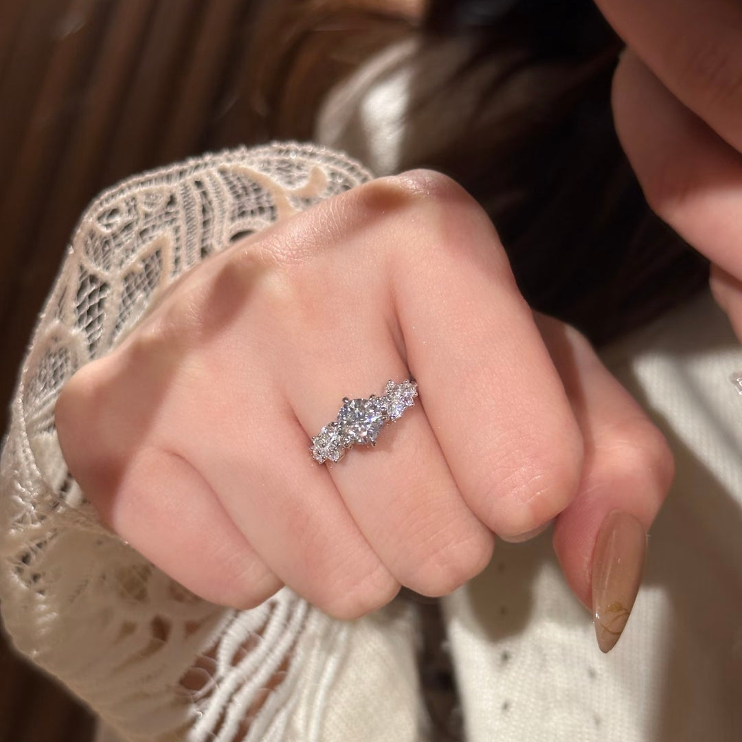 Round-Cut Moissanite Three-Stone Ring — Cluster Side Design