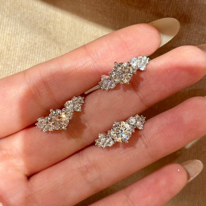 Round-Cut Moissanite Three-Stone Ring — Cluster Side Design