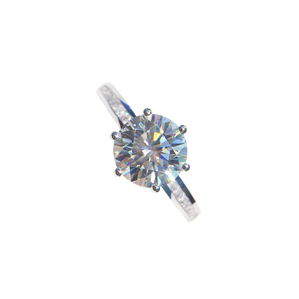 Aurora Six-Prong Moissanite Solitaire Ring with Pavé Shoulders