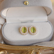 Pearl green cat's eye earrings